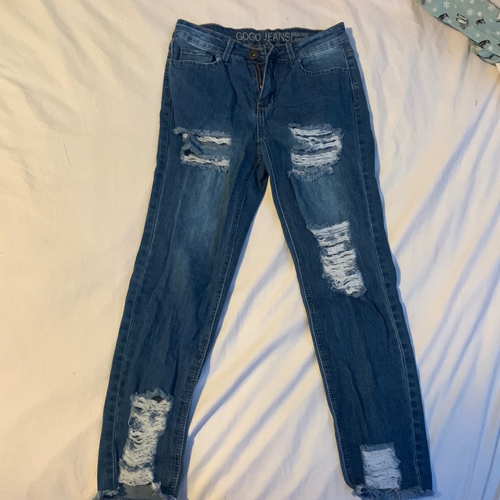 dark blue ripped jeans
